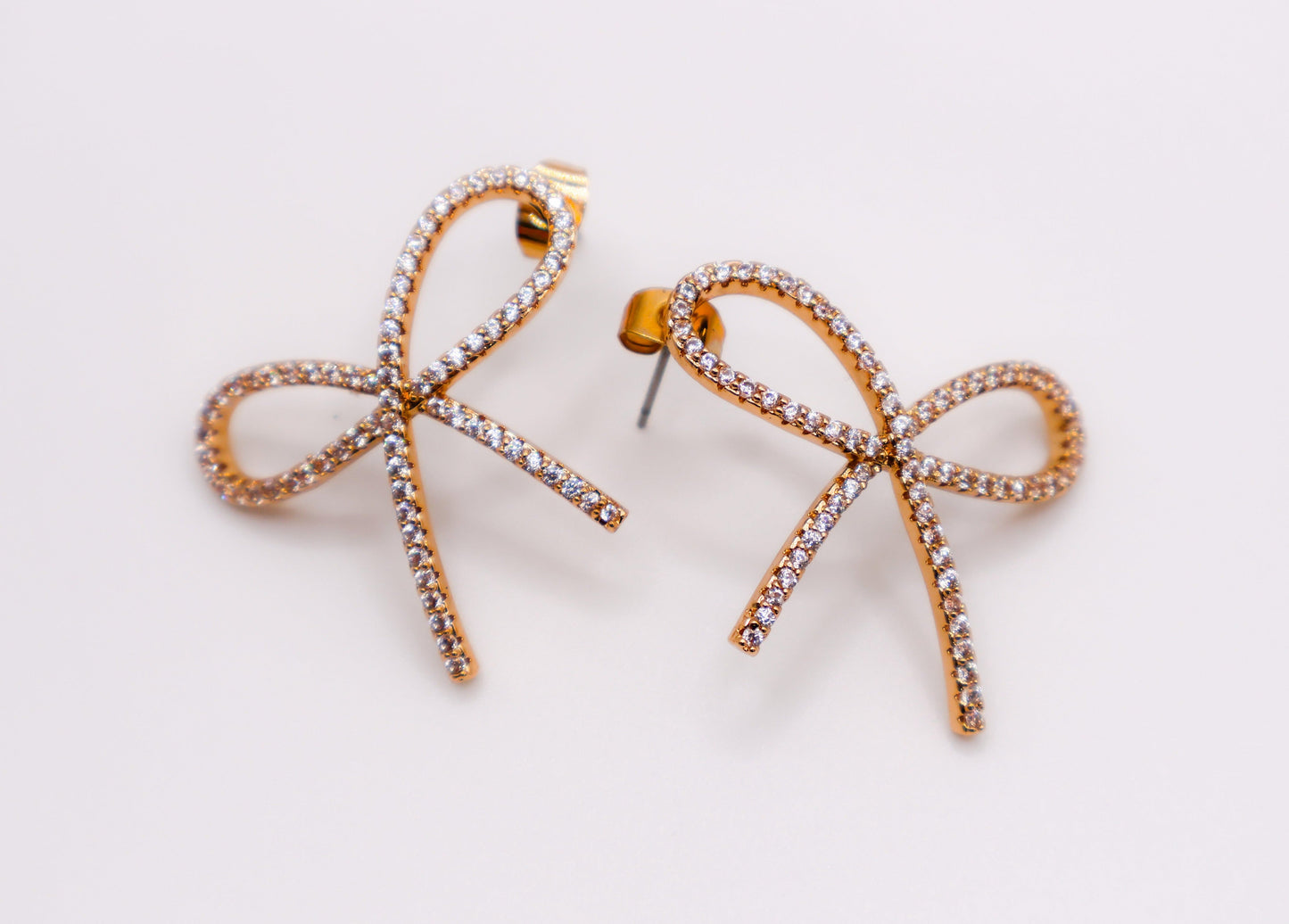 Golden Bow Tie Sparkle Earrings - Elegant Accessory