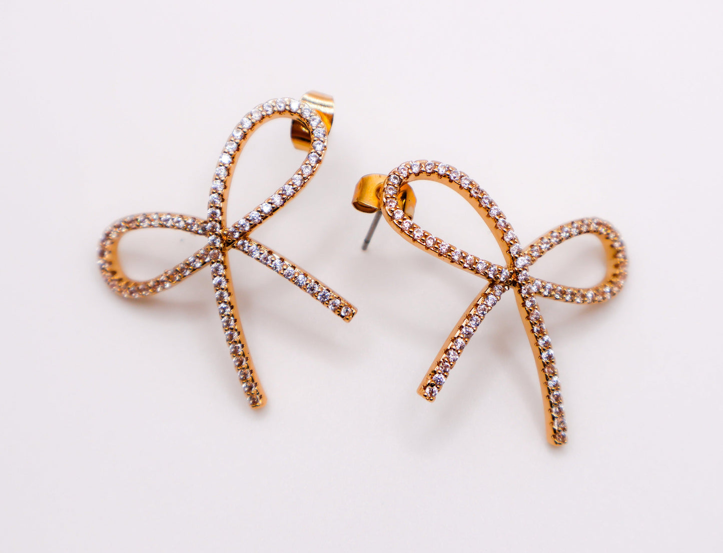 Golden Bow Tie Sparkle Earrings - Elegant Accessory