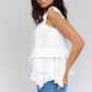 GILLI Sleeveless Asymmetrical Hem Line Tiered Top