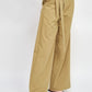 ASYMMETRICAL LONG BELT TROUSERS