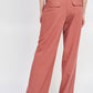 ASYMMETRICAL LONG BELT TROUSERS