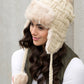 AILI'S CORNER Cable Weave Pom Trapper Hat