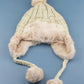 AILI'S CORNER Cable Weave Pom Trapper Hat