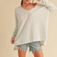 AEMI & Co. Chic V-neck Exposed Seam Sweater- Amaly Sweater