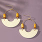 Leather and metal arch earrings with wood beads