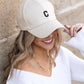 AILI'S CORNER Quilted Puffer Ball Cap