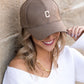 AILI'S CORNER Quilted Puffer Ball Cap