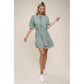 NUVI APPAREL  Tie Neck  Dress Layer Hem Dress