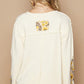 POL Women's Cream Lace Detail Flower Printed V-Neck Knit Top