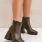 STEP IN STYLE Women's Faux Leather European Squared Heels Boots