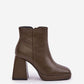 STEP IN STYLE Women's Faux Leather European Squared Heels Boots