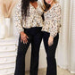 DOUBLE TAKE Printed Tied Plunge Peplum Blouse
