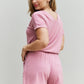 ZENANA Chilled Out Full Size Short Sleeve Romper in Light Carnation Pink