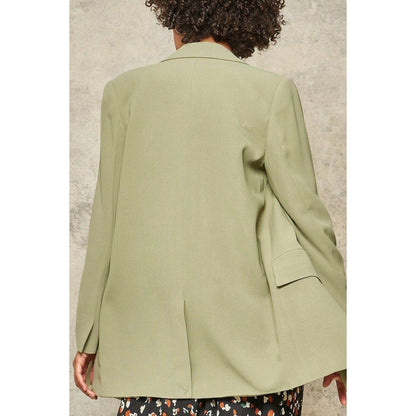 Une veste blazer tissée solide