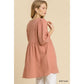 Robe tunique en gaze flammée à col en V et bords effilochés