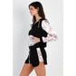Ensemble haut et short à capuche et short zippés noirs et multicolores à imprimé color block