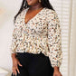 DOUBLE TAKE Printed Tied Plunge Peplum Blouse